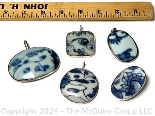 Five (5) Chinese Blue & White Porcelain Shard Pendants in Silver Surround.