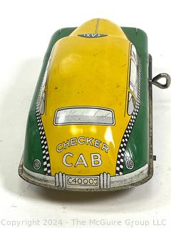 Vintage Walt Reach Toys by Courtland Green & Yellow Checker Cab wind-up