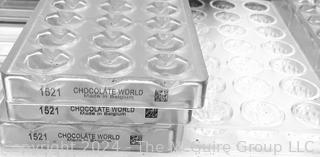 Mixed Group of Candy Molds Including Chocolate World Polycarbonate Molds #2184 & #1521 & 
Silicon Flexipan 1562