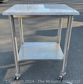 Commercial Stainless Steel Work Table with Lower Shelf on Casters and Marble Top.  24" x 30" 