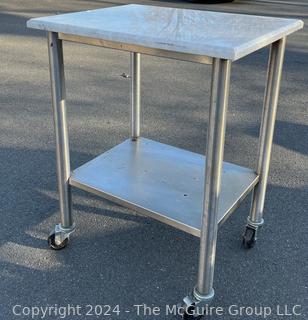 Commercial Stainless Steel Work Table with Lower Shelf on Casters and Marble Top.  24" x 30" 