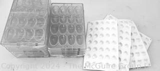 Twelve (12) Chocolate World Polycarbonate Molds #2004 and Four (4) Silicon Mat Mold Trays