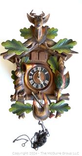 German Carved Wooden Cuckoo Clock. 19" long