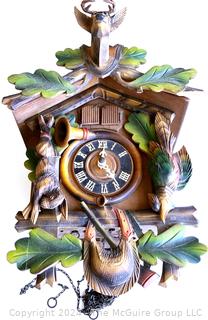 German Carved Wooden Cuckoo Clock. 19" long