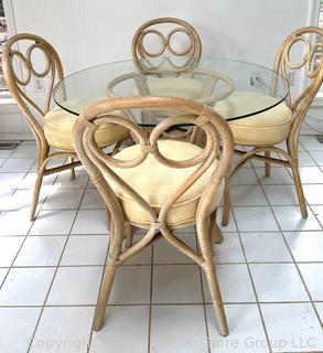 Five (5) Piece Rattan Dining Kitchen Set Including Glass Top Table and Four (4) Bent Wood Chairs. Table Diameter 42"