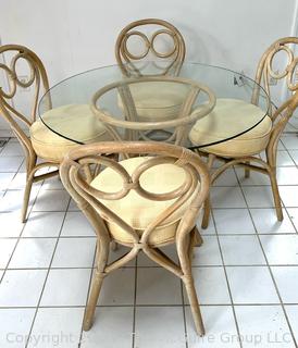 Five (5) Piece Rattan Dining Kitchen Set Including Glass Top Table and Four (4) Bent Wood Chairs. Table Diameter 42"