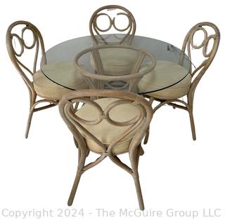 Five (5) Piece Rattan Dining Kitchen Set Including Glass Top Table and Four (4) Bent Wood Chairs. Table Diameter 42"