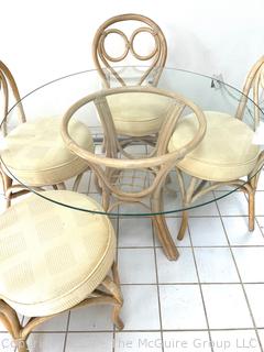 Five (5) Piece Rattan Dining Kitchen Set Including Glass Top Table and Four (4) Bent Wood Chairs. Table Diameter 42"