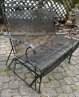 Metal Mesh Garden Love Seat Glider. First of two being offered in this auction. Measures 42 x 22 x 38"