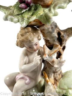 Pair of Cherub Arnart Porcelain Hand Painted Rococo Style Candlestick Holders.  8 1/2" tall.