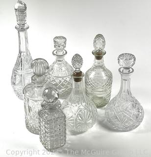 Seven (7) Clear Crystal Liquor Decanters