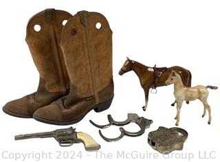 Cowboy Collection Including Boys Wrangler Boots (Size 5E), Toy Horses, Rodeo Cap Gun, Smith and Wesson and Peerless Handcuffs (no keys), and Hubley Paddle Lock Toy Cap Gun (no key)