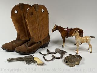 Cowboy Collection Including Boys Wrangler Boots (Size 5E), Toy Horses, Rodeo Cap Gun, Smith and Wesson and Peerless Handcuffs (no keys), and Hubley Paddle Lock Toy Cap Gun (no key)