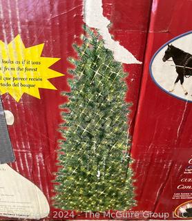 GE 9-ft Oregon Slim Spruce Pre-lit Artificial Christmas Tree in Box.     Was 48