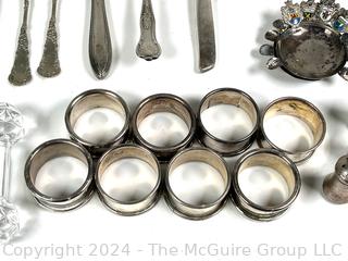 Silver Plate Flatware, Napkin Rings, Candle Holders, Crystal Knife Rest, Etc. Some items found while building Alexandria Square in the 1960's