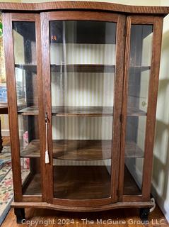 Victorian Oak Bowed Glass Bow Front Curio or China Cabinet. Measures 38w x 15d x 55.5h"
