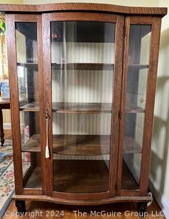 Victorian Oak Bowed Glass Bow Front Curio or China Cabinet. Measures 38w x 15d x 55.5h"
