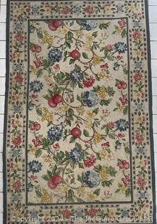 Floral Hook Area Rug on White Ground. Measures 62 x 99"