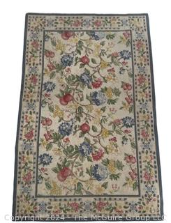 Floral Hook Area Rug on White Ground. Measures 62 x 99"