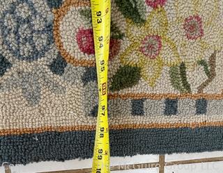 Floral Hook Area Rug on White Ground. Measures 62 x 99"