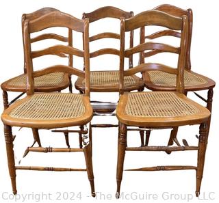 Five (5) Early American Ladder Back Maple and Cane Seat Chairs. 16w x 15d x 33h"