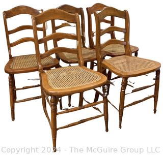 Five (5) Early American Ladder Back Maple and Cane Seat Chairs. 16w x 15d x 33h"