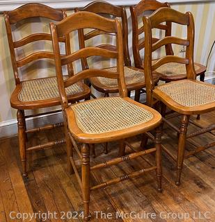 Five (5) Early American Ladder Back Maple and Cane Seat Chairs. 16w x 15d x 33h"