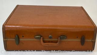 Vintage Samsonite Suitcase with Stickers Circa 50’s Brown Leather. Measures 24w x 18.5d x 9.5h" 