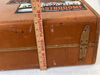 Vintage Samsonite Suitcase with Stickers Circa 50’s Brown Leather. Measures 24w x 18.5d x 9.5h" 