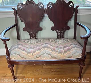 Empire Style Mahogany Shield Back Carved Settee. Measures 39w x 18d x 33h"