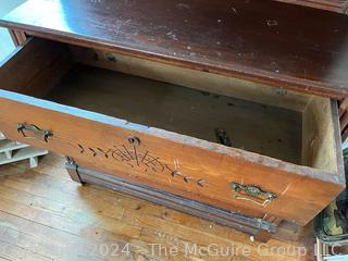 Late 19th Century Eastlake Oak Bureau With Beveled Glass Mirror. Measures 38w x 16.5d x 74h"