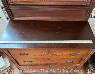 Late 19th Century Eastlake Oak Bureau With Beveled Glass Mirror. Measures 38w x 16.5d x 74h"