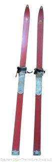 Pair of Vintage Red Laminated Snow Skis Made by Leader. 59" long