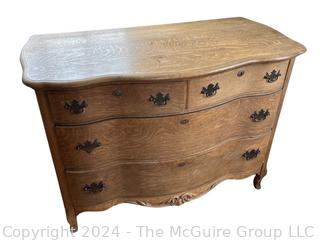 Oak Four (4) Drawer Serpentine Chest of Drawers Dresser. Measures 45w x 23d x 32h"