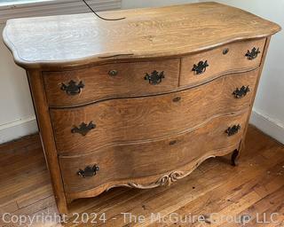 Oak Four (4) Drawer Serpentine Chest of Drawers Dresser. Measures 45w x 23d x 32h"