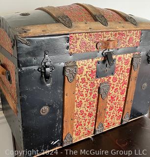 Wood and Filigree Tin Dome Top Steamer Trunk. Measures 26w x 15d x 18h"