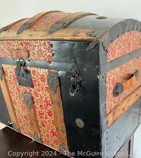 Wood and Filigree Tin Dome Top Steamer Trunk. Measures 26w x 15d x 18h"