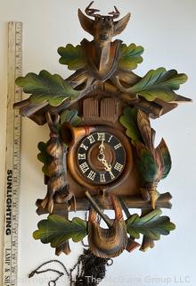 German Carved Wooden Cuckoo Clock. 19" long