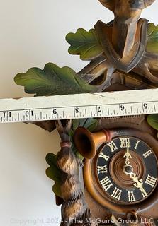 German Carved Wooden Cuckoo Clock. 19" long