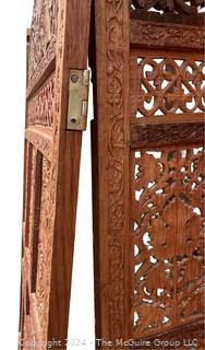 Moroccan Carved Pierced Wood Four (4) Panel Floor Screen.  Needs repair to hinges.  67" tall 80" long (20"W each panel)