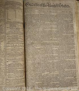 1790-91 Leather Bound Volume with Marbled Covers Containing 96 Issues of the "Gazette of United States" Published Wednesdays and Saturdays by John Fenno.  See Full Issue List Below. Beginning Wednesday, April 14th 1790 and Ending on Saturday, April 2nd 1791. Covers Measure 10 3/8" x 16 3/4".  Pages Measure 10" x 16"