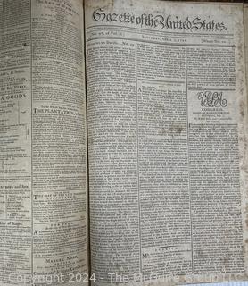 1790-91 Leather Bound Volume with Marbled Covers Containing 96 Issues of the "Gazette of United States" Published Wednesdays and Saturdays by John Fenno.  See Full Issue List Below. Beginning Wednesday, April 14th 1790 and Ending on Saturday, April 2nd 1791. Covers Measure 10 3/8" x 16 3/4".  Pages Measure 10" x 16"