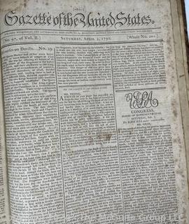 1790-91 Leather Bound Volume with Marbled Covers Containing 96 Issues of the "Gazette of United States" Published Wednesdays and Saturdays by John Fenno.  See Full Issue List Below. Beginning Wednesday, April 14th 1790 and Ending on Saturday, April 2nd 1791. Covers Measure 10 3/8" x 16 3/4".  Pages Measure 10" x 16"