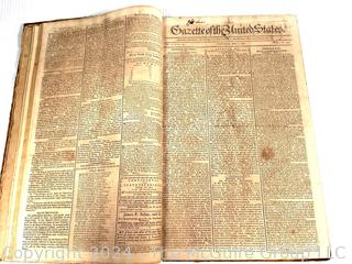 1790-91 Leather Bound Volume with Marbled Covers Containing 96 Issues of the "Gazette of United States" Published Wednesdays and Saturdays by John Fenno.  See Full Issue List Below. Beginning Wednesday, April 14th 1790 and Ending on Saturday, April 2nd 1791. Covers Measure 10 3/8" x 16 3/4".  Pages Measure 10" x 16"