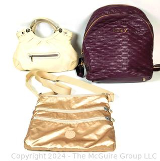 Three (3) Contemporary Handbags by DKNY and Kipling 