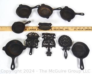 Cast Iron Trivets and Pan Shaped Ashtrays,  Wagner-Ware 