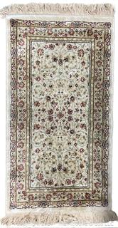 Area Rug on Beige Ground.  23" x 46"  Machine Made