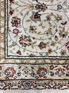 Area Rug on Beige Ground.  23" x 46"  Machine Made