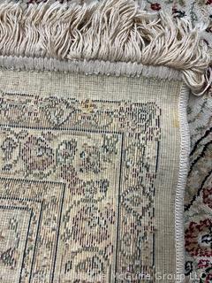 Area Rug on Beige Ground.  23" x 46"  Machine Made