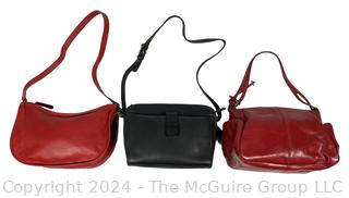 Three (3) Leather Handbags by Coach and Hobo